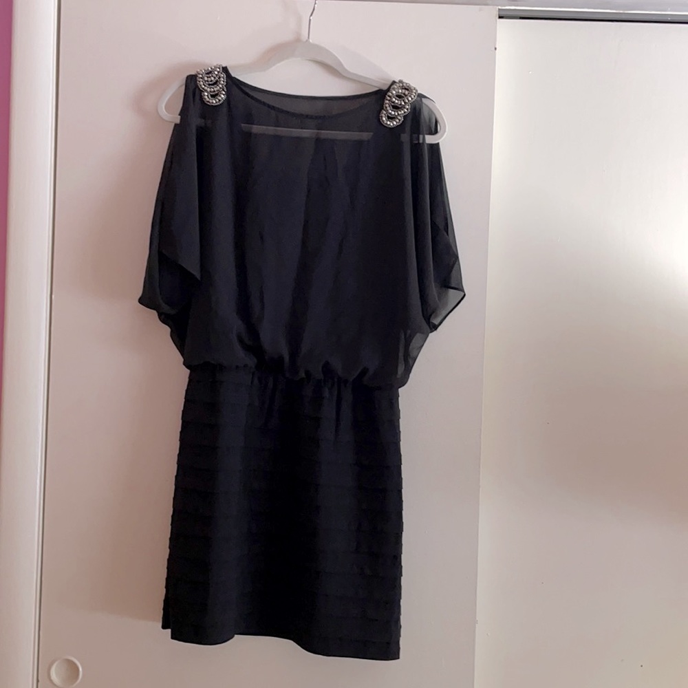 Black dress with embellished shoulder detail